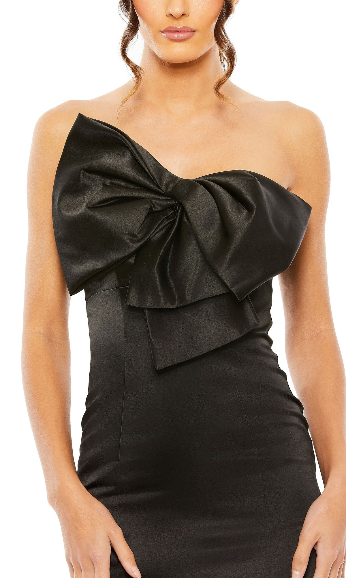 Woman wearing the Mac Duggal 49701 Strapless Mermaid Formal Dress, highlighted by a large, prominent chest bow for a striking evening gown style.